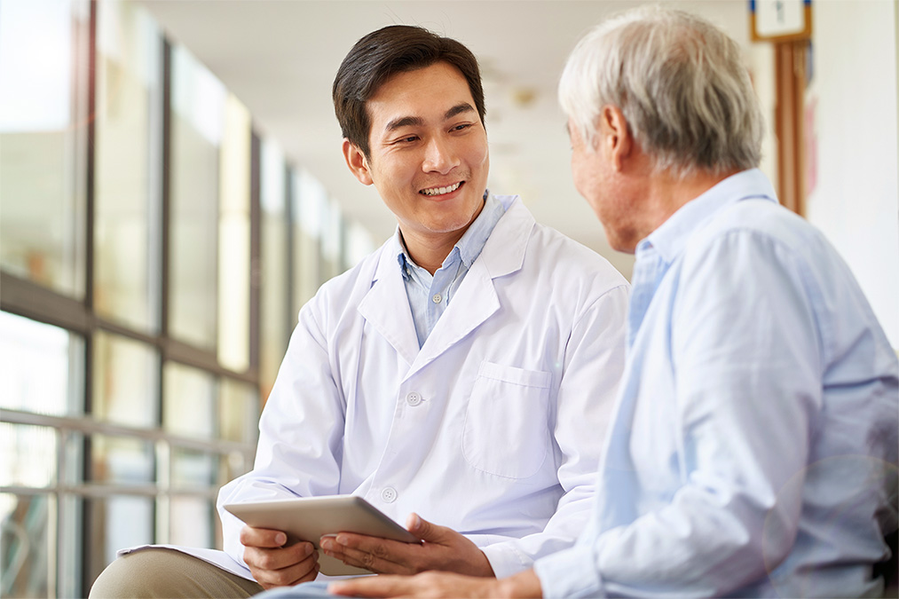 Emergency Medicine Physician Speaking with ER Patient