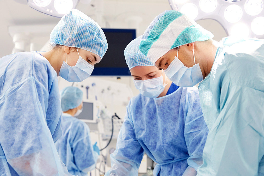 Surgeons in hospital operating room